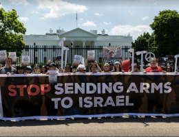 Activists demand an end to U.S. arms transfers to Israel during a May 2, 2024 protest outside the White House in Washington, D.C. (Photo: Amnesty International USA)